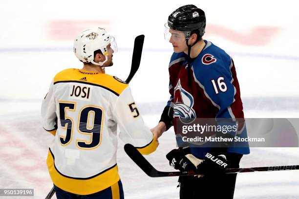 Roman Josi of the Nashville Predators is congratulated by Nikita Zadorov of the Colorado Avalanche after the Predators win in Game Six of the Western...