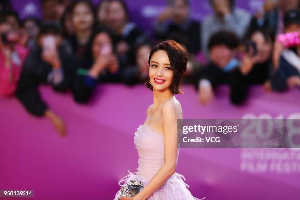 Actress Tong Liya poses on red carpet of the closing ceremony of the 8th Beijing International Film Festival and the Award Ceremony of Tiantan Award...