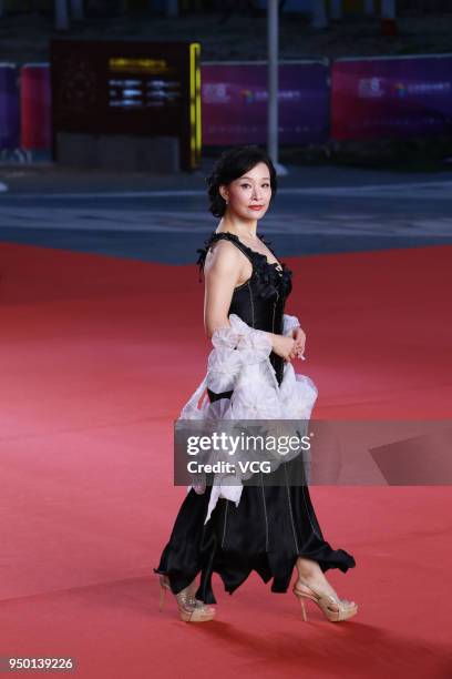 Actress Joan Chen Chong poses on red carpet of the closing ceremony of the 8th Beijing International Film Festival and the Award Ceremony of Tiantan...