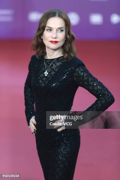 French actress Isabelle Huppert poses on red carpet of the closing ceremony of the 8th Beijing International Film Festival and the Award Ceremony of...