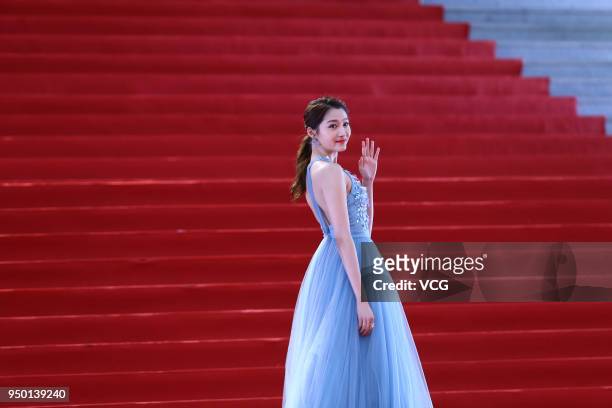 Actress Guan Xiaotong poses on red carpet of the closing ceremony of the 8th Beijing International Film Festival and the Award Ceremony of Tiantan...