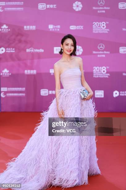 Actress Tong Liya poses on red carpet of the closing ceremony of the 8th Beijing International Film Festival and the Award Ceremony of Tiantan Award...