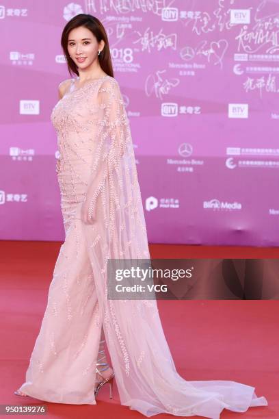 Actress/model Lin Chi-ling poses on red carpet of the closing ceremony of the 8th Beijing International Film Festival and the Award Ceremony of...