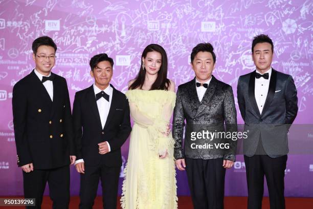 Actor Wang Xun, actor Wang Baoqiang, actress Shu Qi, director Huang Bo and actor Yu Hewei pose on red carpet of the closing ceremony of the 8th...