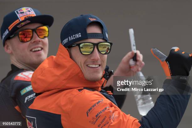 Pol Espargaro of Spain and Red Bull KTM Factory Racing and Bradley Smith of Great Britain and Red Bull KTM Factory Racing smiles during the MotoGP...