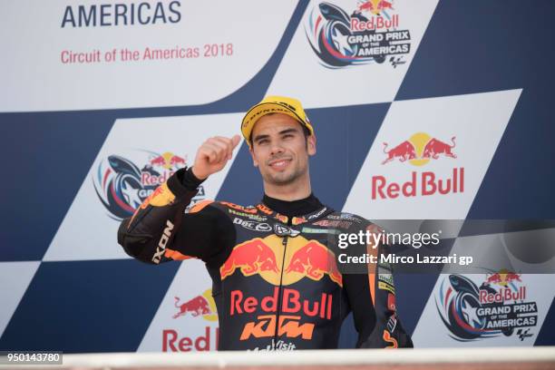 Miguel Oliveira of Portugal and Red Bull KTM celebrates the third place on the podium at the end of the Moto2 race during the MotoGp Red Bull U.S....