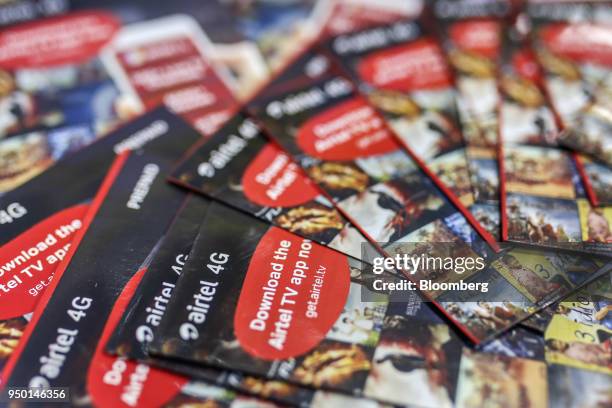 Bharti Airtel Ltd. Sim card packs are arranged for a photograph at store in Mumbai, India, on Saturday, April 21, 2018. Bharti Airtel are scheduled...