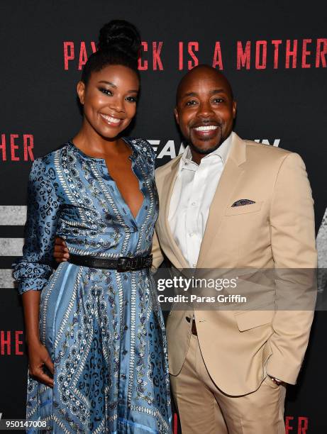 Actress Gabrielle Union and producer Will Packer attend "Breaking In" Atlanta Private Screening at Regal Atlantic Station on April 22, 2018 in...