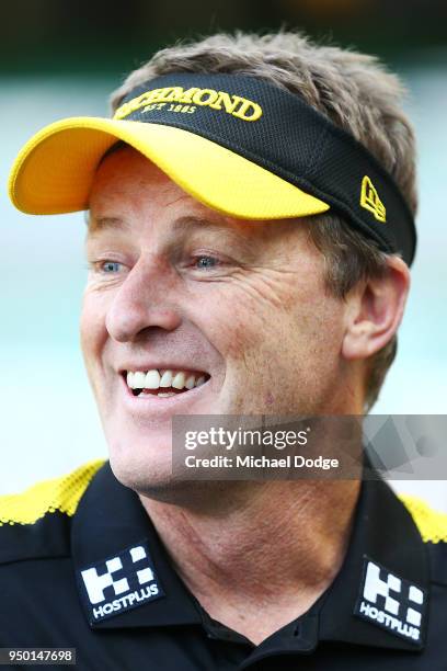 Tigers head coach Damien Hardwick reacts as he speaks to media during an Melbourne Demons and Richmond Tigers AFL pre match press conference on April...