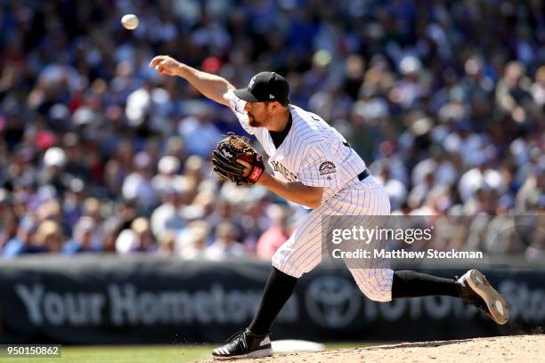 Pitcher Bryan Shaw of the Colorado Rockies throws in the sixth inning against the Chicago Cubs at Coors Field on April 22, 2018 in Denver, Colorado.