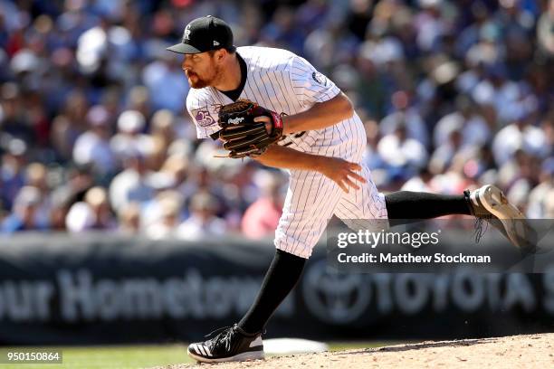 Pitcher Bryan Shaw of the Colorado Rockies throws in the sixth inning against the Chicago Cubs at Coors Field on April 22, 2018 in Denver, Colorado.