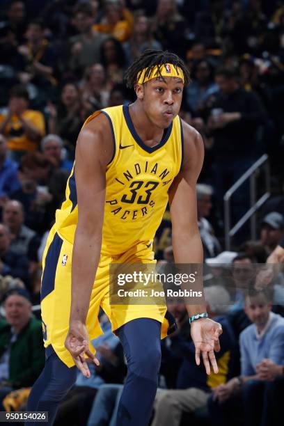 Myles Turner of the Indiana Pacers reacts after making a three-point basket against the Cleveland Cavaliers in the second half of game four of the...