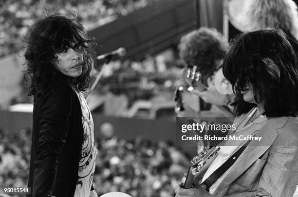 Steven Tyler, Brad Whitford, Tom Hamilton and Joe Perry of Aerosmith perform live at The Oakland Coliseum in 1977 in San Francisco, California.