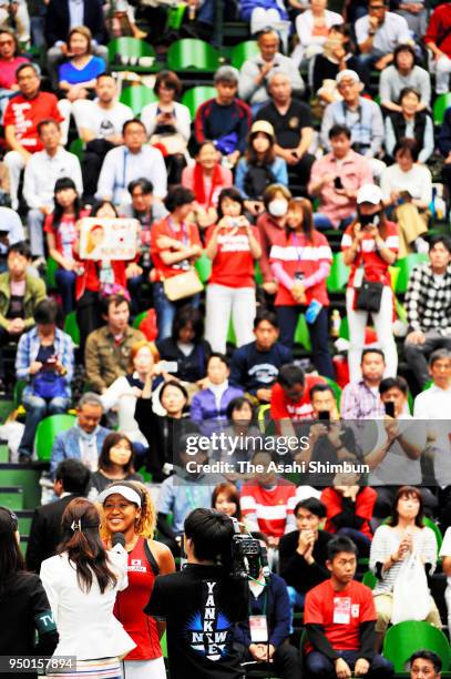 Naomi Osaka of Japan is interviewed after her match against Heather Watson of Great Britain during day one of the Fed Cup World Group II Play-Off...