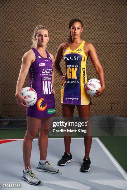 Gabi Simpson of the Queensland Firebirds and Geva Mentor of the Sunshine Coast Lightning pose during the Suncorp Super Netball 2018 season launch on...