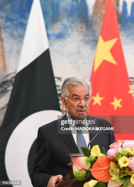 Pakistans Foreign Minister Khawaja Muhammad Asif speaks during his press conference with Chinese State Councilor and Foreign Minister Wang Yi at the...