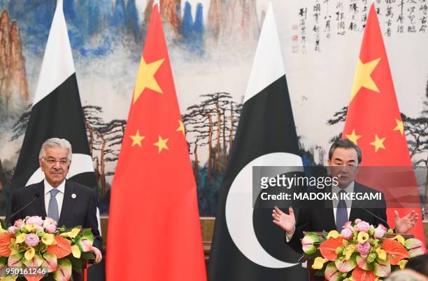 Pakistans Foreign Minister Khawaja Muhammad Asif and Chinese State Councilor and Foreign Minister Wang Yi have a press conference after their meeting...