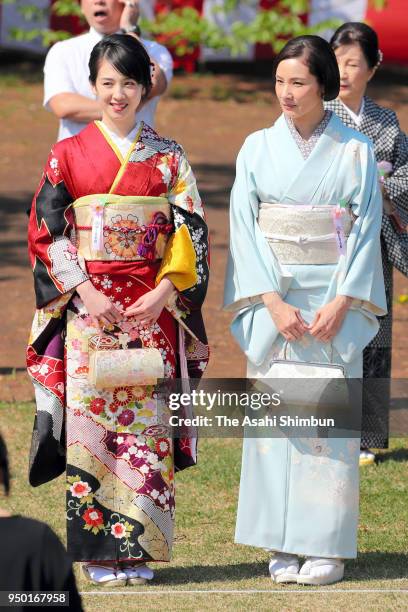 Actors Minami Sakuraba and Yo Yoshida attend the cherry blossom viewing party hosted by Japanese Prime Minister Shinzo Abe at Shinjuku Gyoen Park on...