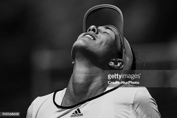 The image has been converted to black and white) Garbine Muguruza of Spain celebrates the victory in her match against Veronica Cepede Royg of...