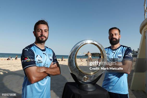 Sydney FC captain Alex Brosque and team mate Michael Zullo pose with the A-League trophy during a Sydney FC A-League Semi Final media opportunity at...