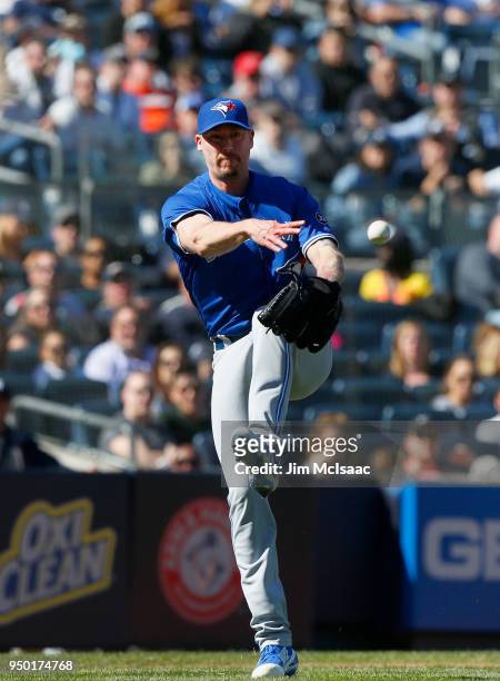 John Axford of the Toronto Blue Jays in action against the New York Yankees at Yankee Stadium on April 22, 2018 in the Bronx borough of New York...