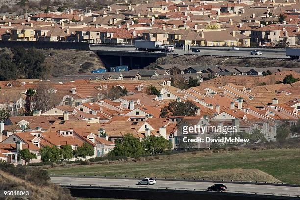 Tract homes are seen on December 22, 2009 in Santa Clarita, California. Existing U.S. Home sales rose 7.4 percent in November, fueled by the...