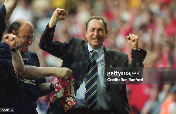 Liverpool manager Gerard Houllier celebrates an amazing victory after the AXA sponsored FA Cup Final against Arsenal played at the Millennium...