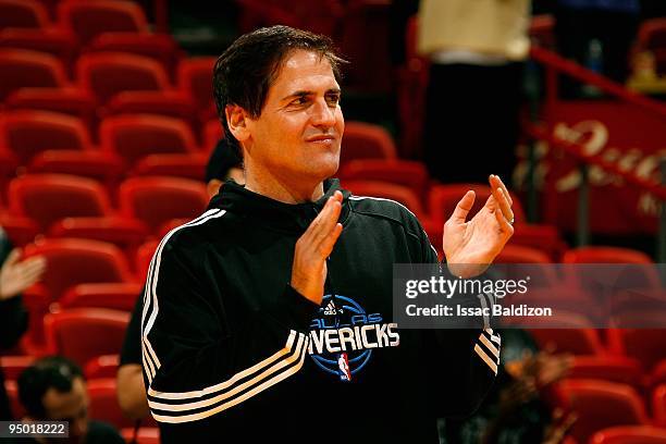 Owner Mark Cuban of the Dallas Mavericks stands on the court before the game against the Miami Heat on December 11, 2009 at American Airlines Arena...