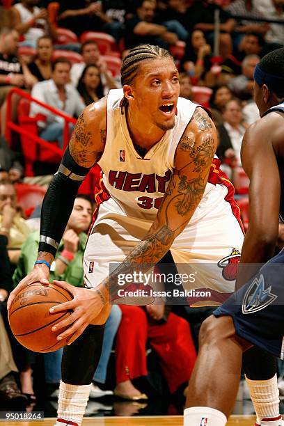 Michael Beasley of the Miami Heat looks to pass during the game against the Dallas Mavericks on December 11, 2009 at American Airlines Arena in...