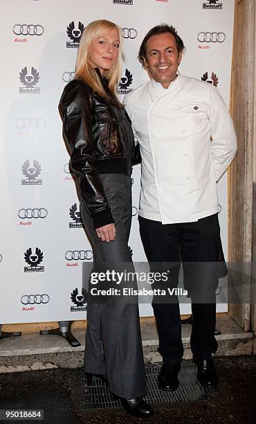 Italian chef Filippo La Mantia and a model attends "Amelia" Premiere Cocktail Party hosted by Belstaff at Belstaff boutique on December 22, 2009 in...
