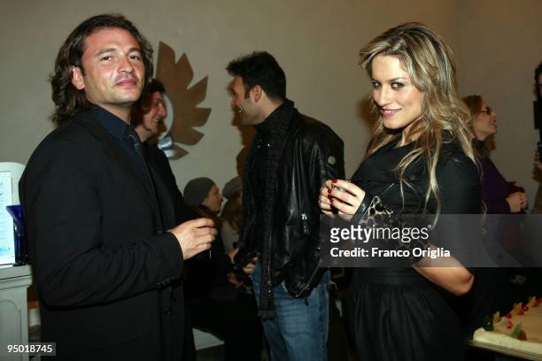 Singer Lola Ponce and Vice President of Belstaff Manuele Malenotti attend the "Amelia" premiere cocktail party at the Belstaff Rome store on December...