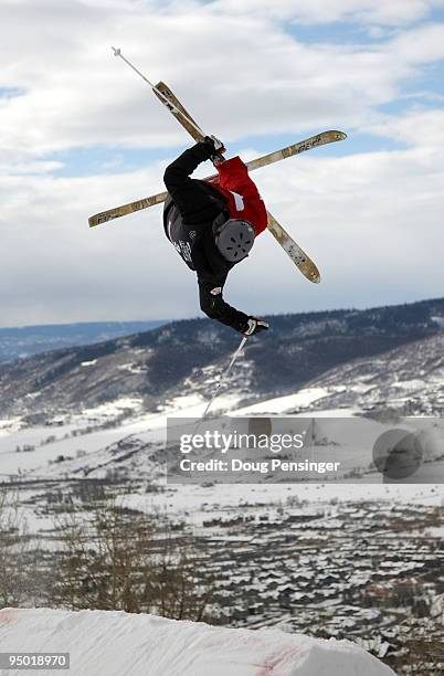 Michael Morse does an aerial on the mogul course during training for the US Freestyle Skiing Olympic Trials on December 22, 2009 in Steamboat...