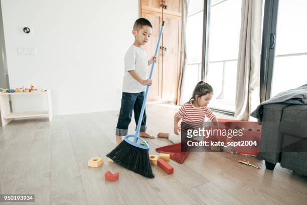 houseworks for kids - kids housework stock pictures, royalty-free photos & images