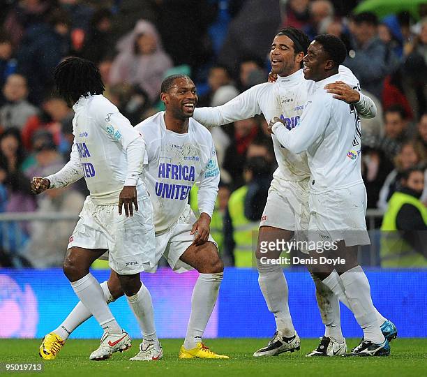 Africa United players celebrate after scoring a goal against the Spanish La Liga Selection during the charity match between Africa United and the La...