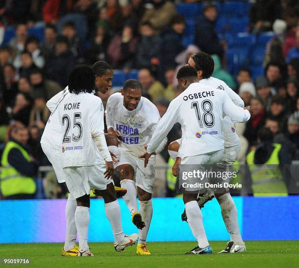 Daniel Kome and Bartholomew Ogbeche of Africa United celebrate after scoring a goal against the Spanish La Liga Selection during the charity match...