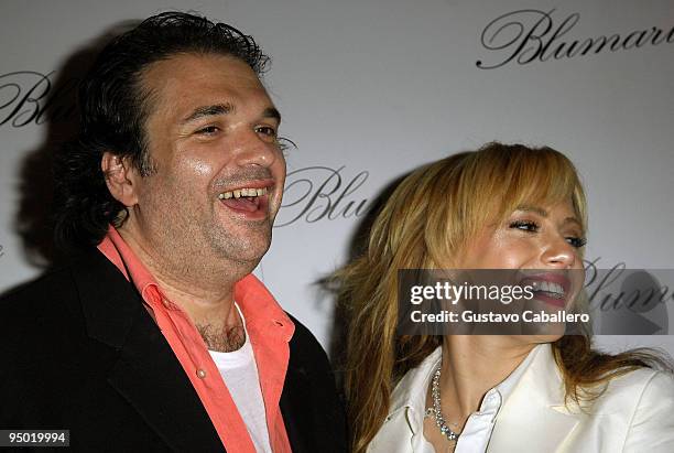 Simon Monjack and Brittany Murphy pose at the opening of the flagship store in the United States at the Village of Merrick Park on April 2, 2008 in...