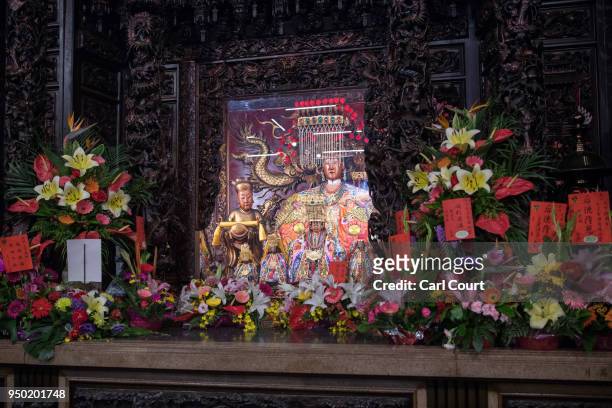 Statue of the goddess Mazu is displayed in Jenn LannÂ Temple following its return after being carried in a sedan chair on the nine day Mazu...