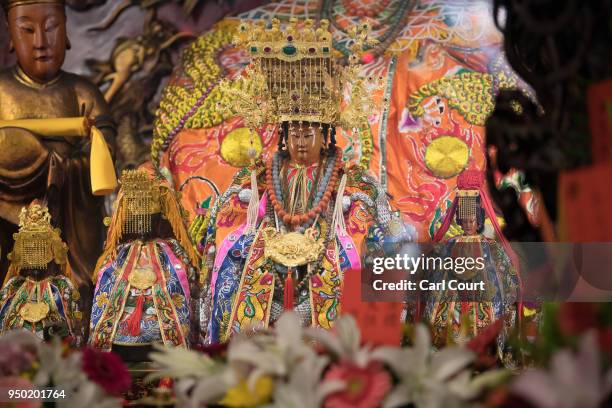 Statue of the goddess Mazu is displayed in Jenn Lann Temple following its return after being carried in a sedan chair on the nine day Mazu pilgrimage...