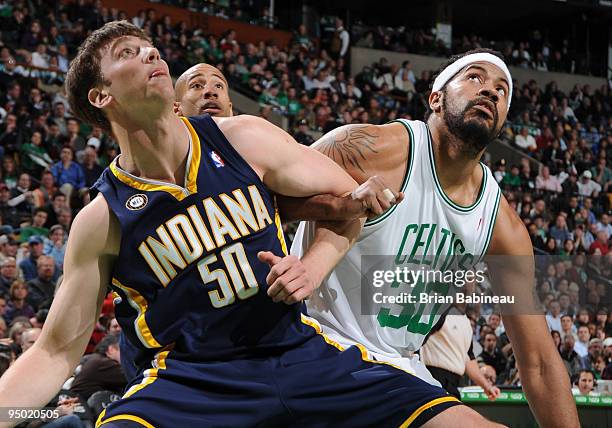 Tyler Hansbrough of the Indiana Pacers gets position under the basket against Rasheed Wallace of the Boston Celtics on December 22, 2009 at the TD...