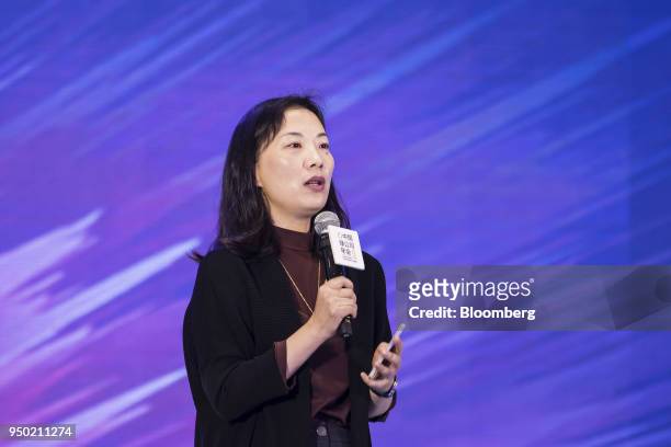 Tong Wenhong, chief people officer of Alibaba Group Holding Ltd., speaks during the China Green Companies Summit in Tianjin, China, on Monday, April...