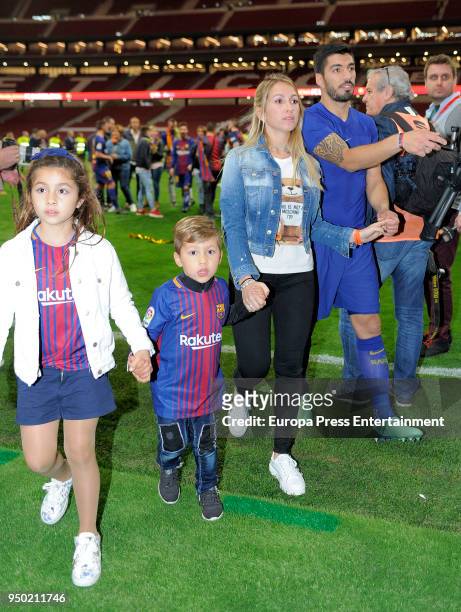 Luis Suarez, his wife Sofia Balbi and their children Delfina Suarez and Benjamin Suarez are seen at the Spanish Copa del Rey Final match between...