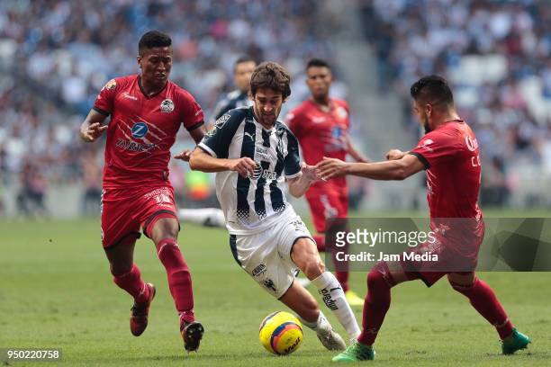 Pedro Aquino of Lobos BUAP and Lucas Albertengo of Monterrey fight for the ball during the 16th round match between Monterrey and Lobos BUAP as part...