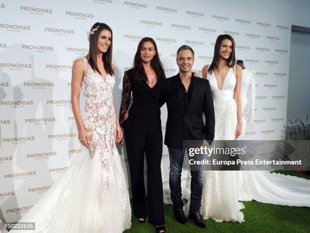 Irina Shayk and Herve Moreau pose during a photocall for the Pronovias Bridal fitting for Barcelona Bridal Week 2018 on April 22, 2018 in Barcelona,...