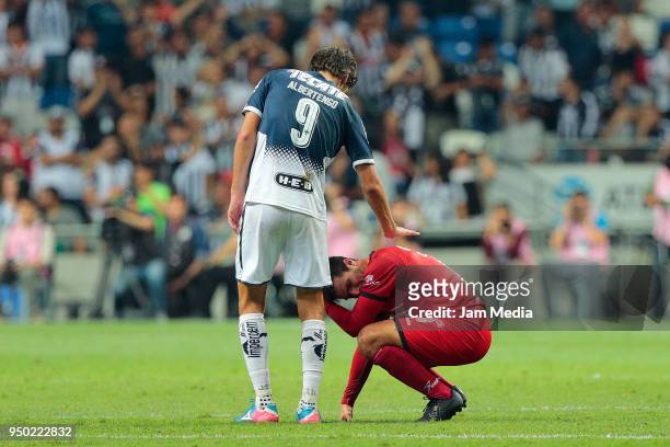 Lucas Albertengo of Monterrey gives support to Carlos Trevino of Lobos after the 16th round match between Monterrey and Lobos BUAP as part of the...