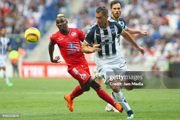 Julian Quinones of Lobos BUAP and Nicolas Sanchez of Monterrey fight for the ball during the 16th round match between Monterrey and Lobos BUAP as...