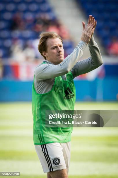 Dax McCarty of Chicago Fire claps to fans during the Major League Soccer match between Chicago Fire and New York Red Bulls at Red Bull Arena on April...