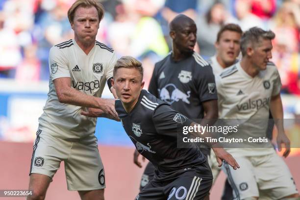 Dax McCarty of Chicago Fire and Marc Rzatkowski of New York Red Bulls jostle for position at a corner during the New York Red Bulls Vs Chicago Fire...