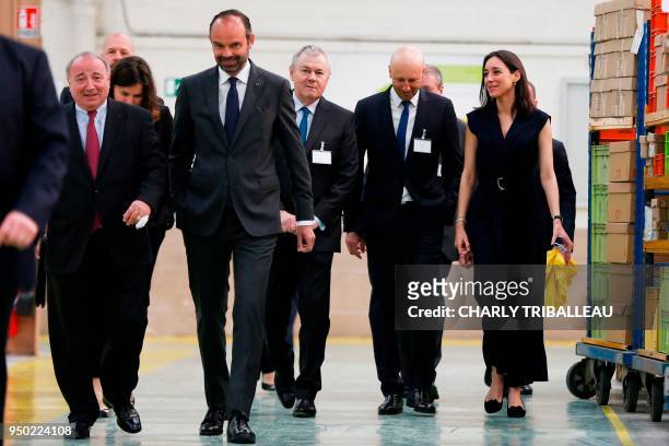 Thierry de La Tour d'Artaise, CEO of small domestic appliances and cookware Groupe Seb Moulinex , French Prime Minister Edouard Philippe and French...