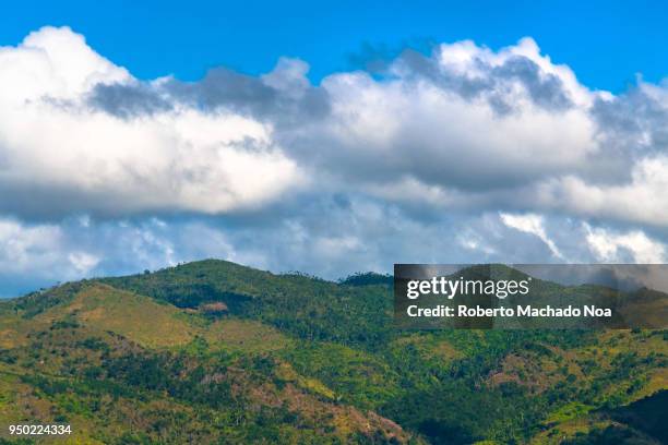 Beautiful Cuban countryside, point of view from the Manaca Iznaga tower. The colonial village of Trinidad is a Unesco World Heritage Site and a major...