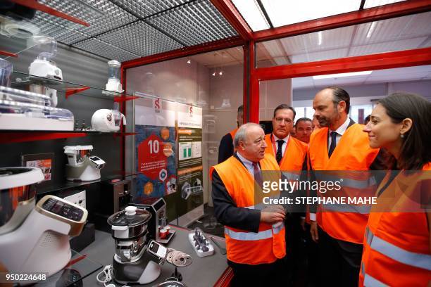 Thierry de la Tour d'Artaise, chairman and CEO of French electrical goods company Groupe SEB , French Prime Minister Edouard Philippe and French...